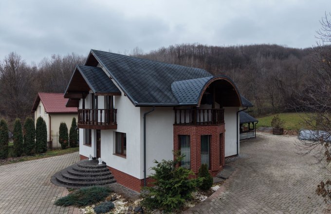Casă parter+mansardă, Tăuții Măgherăuș ,teren 20 arii lângă pădure
