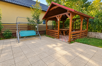 Sunny Backyard Patio with Wooden Gazebo